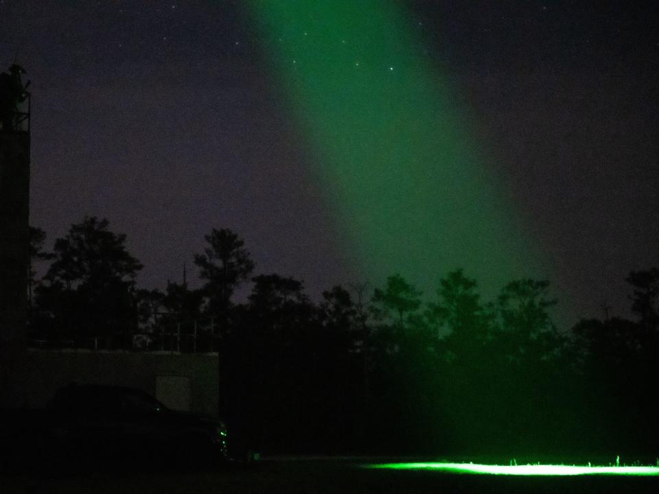 AC-130J Ghostrider gunship green laser beam