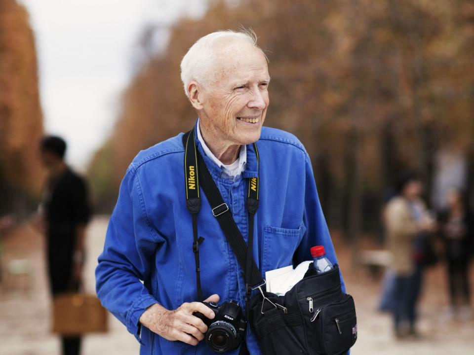 Bill Cunningham was immediately identifiable, always dressed in the same blue French worker’s jacket: Scott Schuman