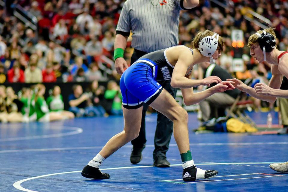 Van Meter's Quinn Arellano gets set to wrestle an opponent during the Iowa high school state wrestling tournament at Wells Fargo Arena in Des Moines on Thursday, Feb. 16, 2023.