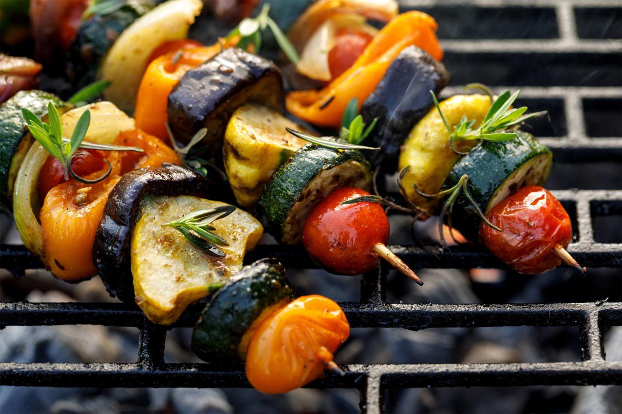 Vegetables on skewers on the grill