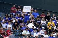 Fans show support for the town of Uvalde, Texas, during the second inning of a baseball game between the Arizona Diamondbacks and the Los Angeles Dodgers, Friday, May 27, 2022, in Phoenix. (AP Photo/Ross D. Franklin)