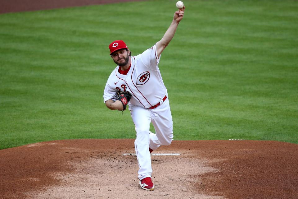 Cincinnati Reds starting pitcher Wade Miley (22) delivers in the first inning during a baseball game against the San Francisco Giants, Wednesday, May 19, 2021, at Great American Ball Park in Cincinnati. 