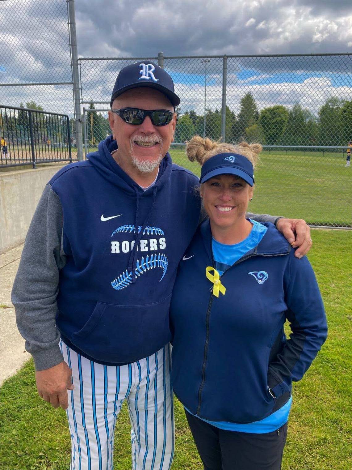 Jaclyn Ramsey, right, and her father, Doug James, left, worked together at Rogers High a few years after she began coaching. She was the head coach while her father was the assistant coach.