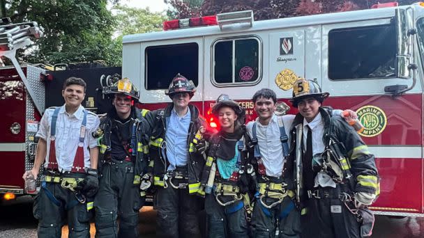 PHOTO: Six students from Port Jefferson High School on Long Island, who are fire department volunteers, raced to help put out a blaze just moments after collecting their diplomas. (Port Jefferson Fire Department)