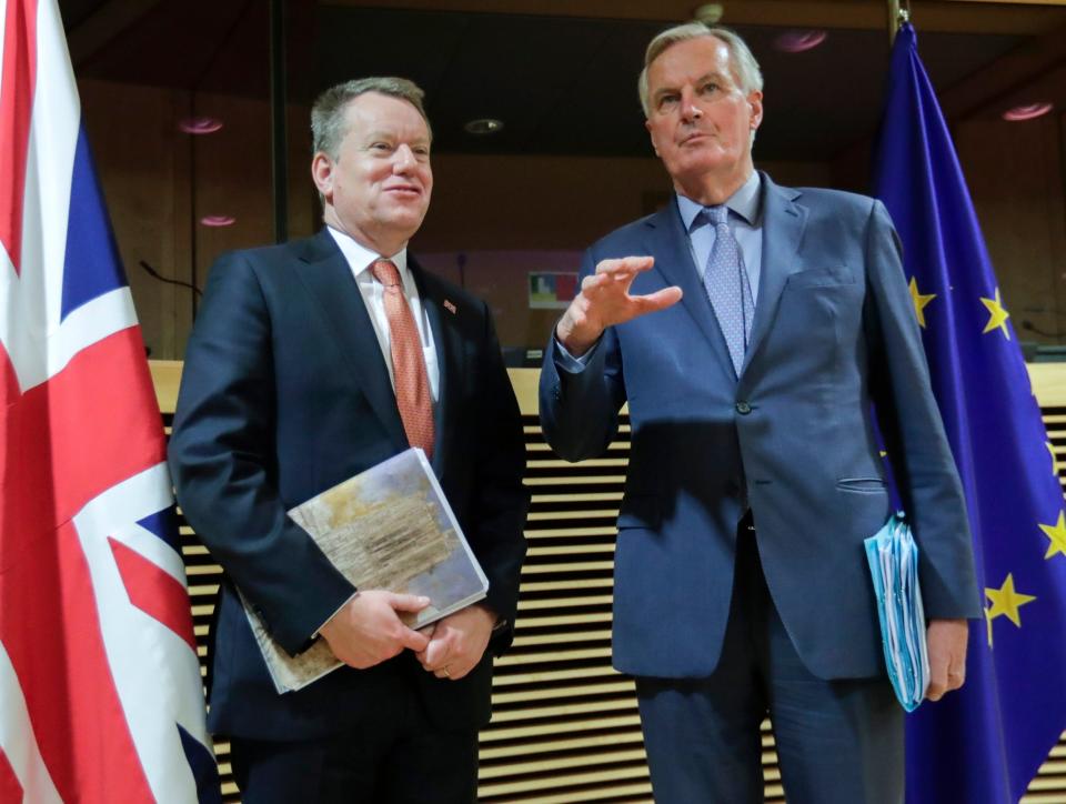 David Frost has called on EU negotiator Michel Barnier (right) to drop his 'ideological' approach (AP)