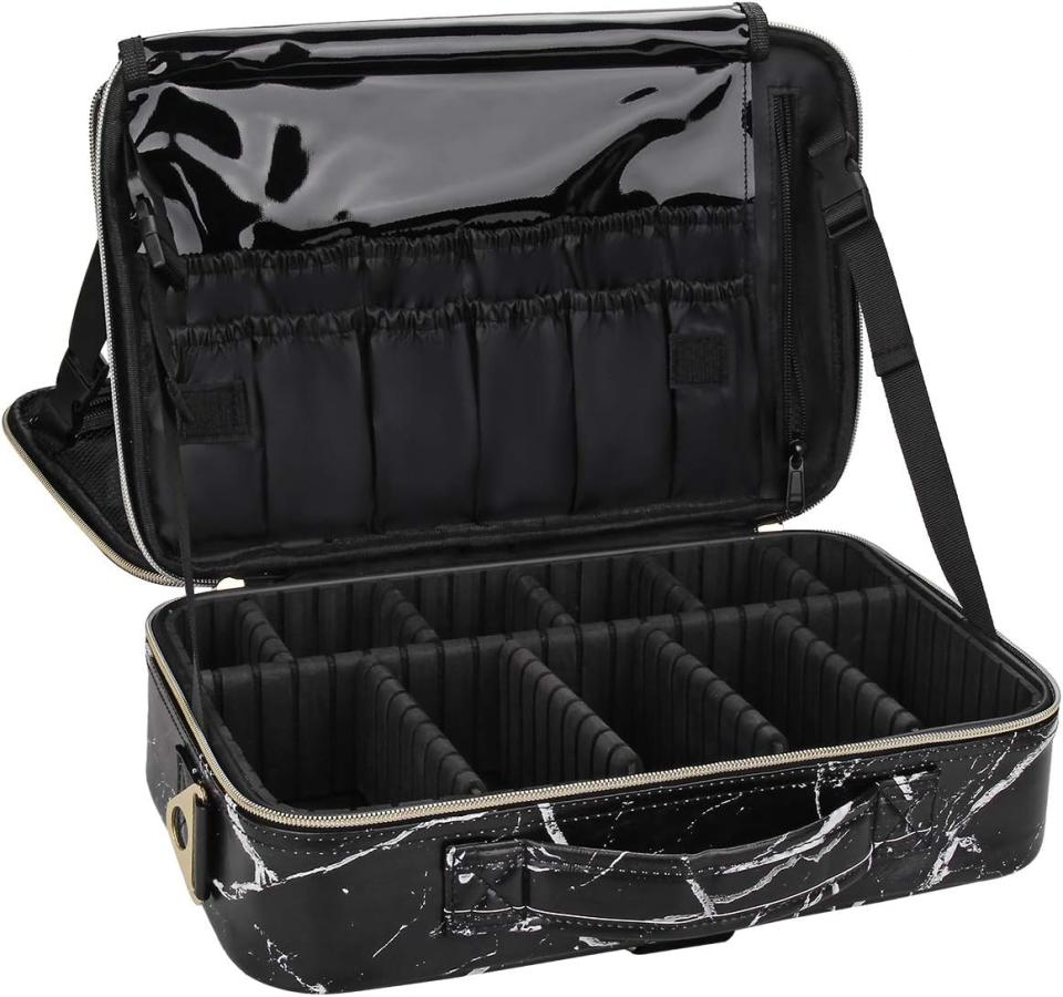 black and white marble travel case with slots for makeup