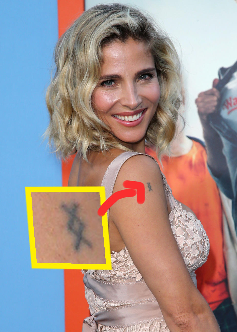 A close-up of the tattoo on her upper arm; it essentially looks like two X's stacked on top of each other