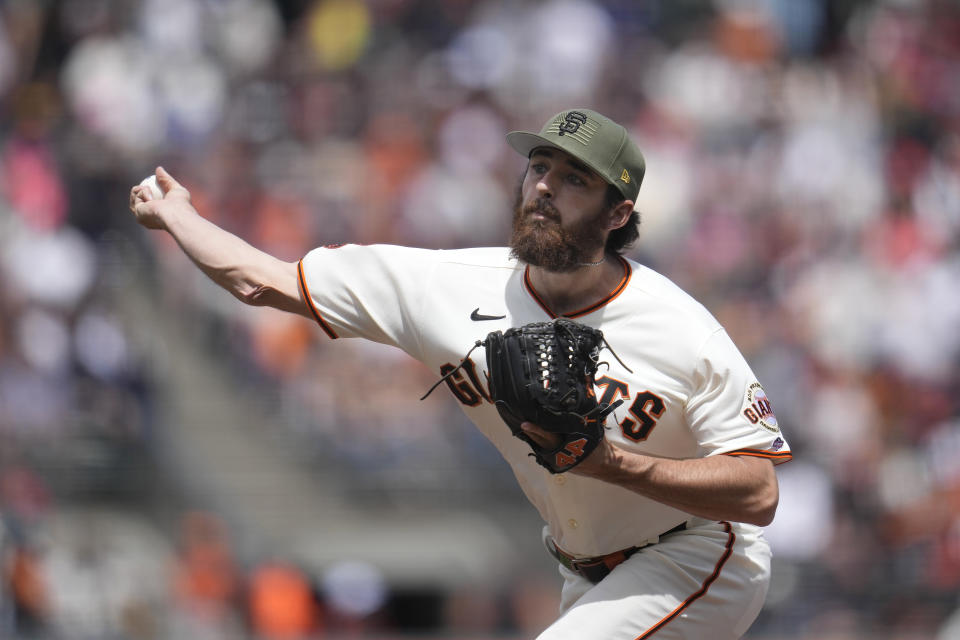 San Francisco Giants' Ryan Walker pitches against the Miami Marlins during the sixth inning of a baseball game in San Francisco, Sunday, May 21, 2023. (AP Photo/Jeff Chiu)