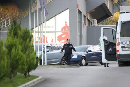 A police officer is seen outside the headquarters of the Bulgarian Football Union in Sofia, Bulgaria