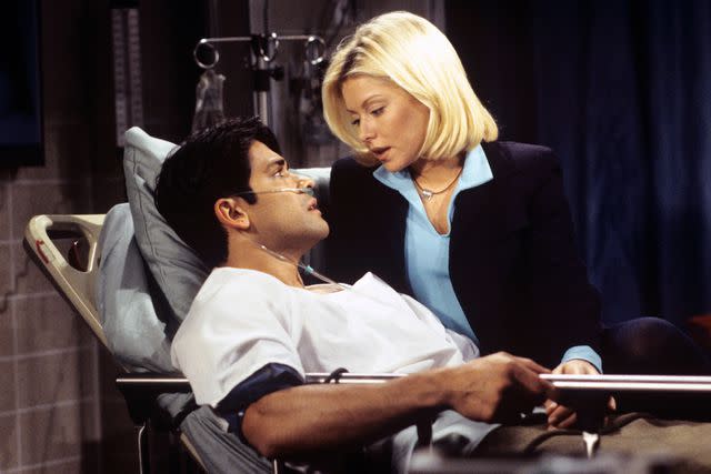 <p>Ann Limongello/Disney General Entertainment Content via Getty </p> Kelly Ripa and Mark Consuelos in 'All My Children'