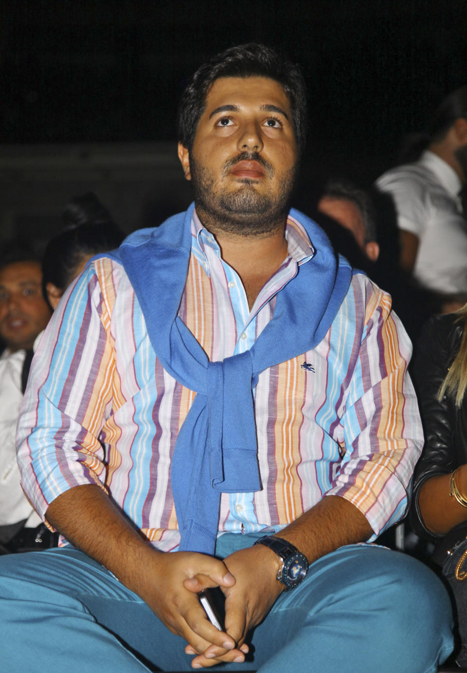 Turkish-Iranian businessman Reza Zarrab, charged in the U.S. for evading sanctions on Iran, watches a concert in Istanbul on Sept 8, 2013. (Photo: Depo Photos via AP)