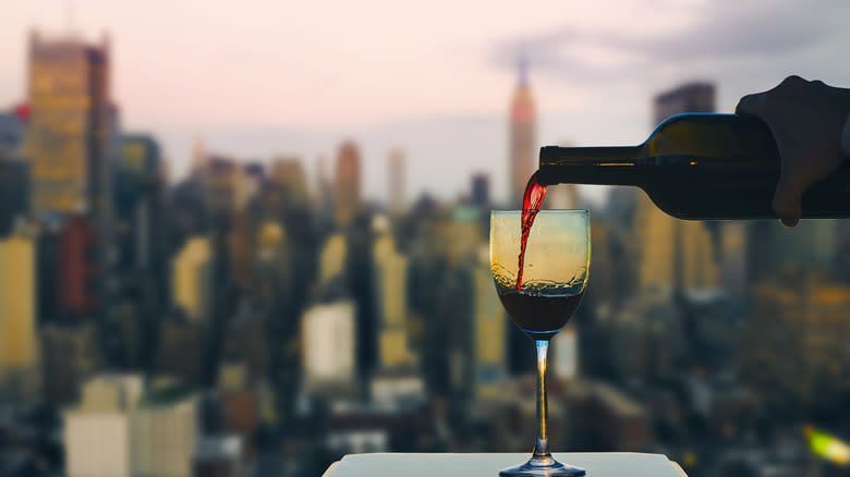 pouring wine Manhattan background