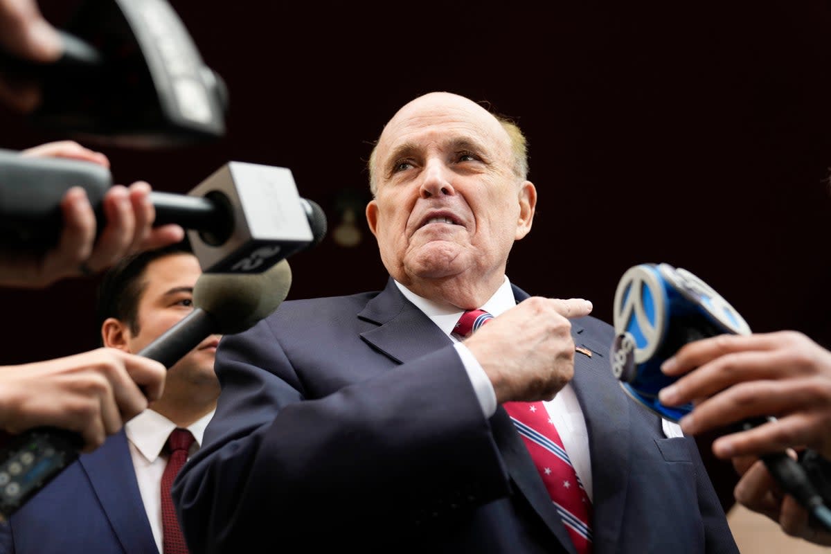Rudy Giuliani as he left his apartment in New York on Wednesday to travel to Georgia (Copyright 2023 The Associated Press. All rights reserved.)