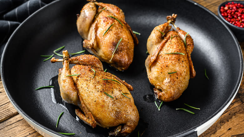 quail in cast iron pan