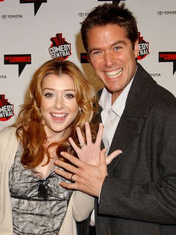 <p>Gregg DeGuire/WireImage</p> Alyson Hannigan and Alexis Denisof at Comedy Central's First Annual Commie Awards.