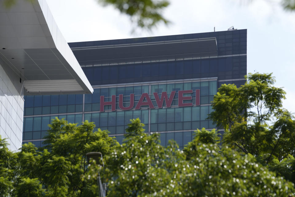 The company logo of Huawei is seen on a building in the sprawling Huawei headquarters campus in Shenzhen, China, Saturday, Sept. 25, 2021. Two Canadians detained in China on spying charges were released from prison and flown out of the country on Friday, Prime Minister Justin Trudeau said, just after a top executive of Chinese communications giant Huawei Technologies reached a deal with the U.S. Justice Department over fraud charges and flew to China. (AP Photo/Ng Han Guan)