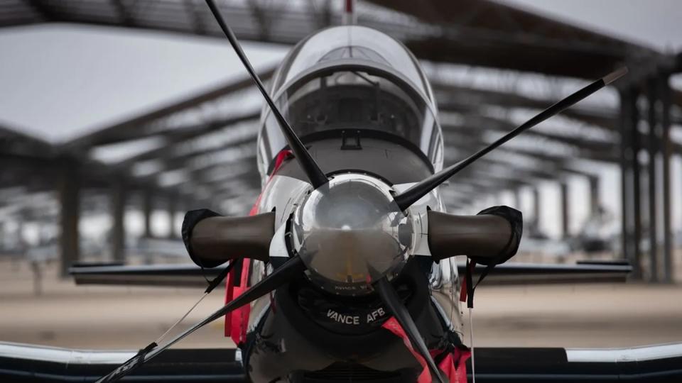 A T-6A Texan II rests under a hangar at Vance Air Force Base, Okla., Nov. 3, 2022. (Second Lt. Jonathan Soferr/Air Force)