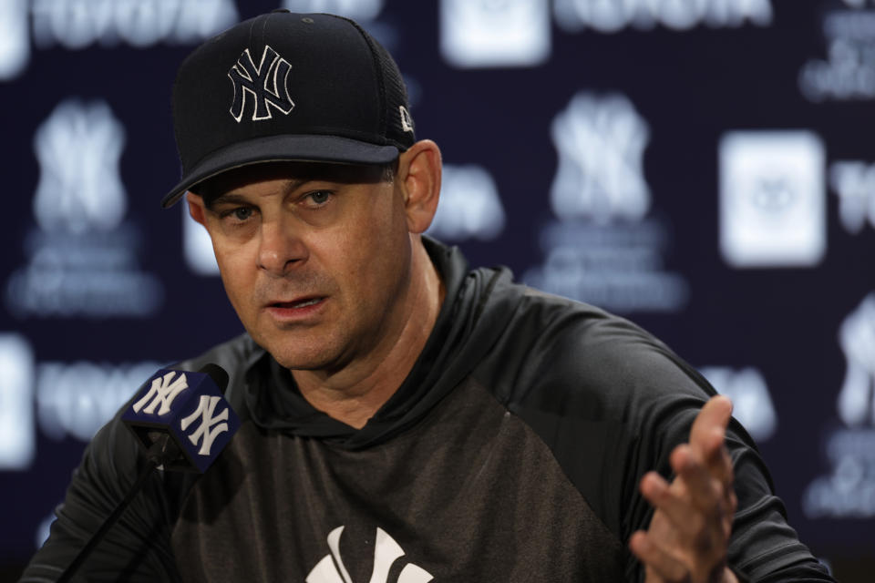 New York Yankees manager Aaron Boone speaks to reporters on Thursday, April 7, 2022, in New York. The Yankees will face the Boston Red Sox in a baseball game on Friday. (AP Photo/Adam Hunger)