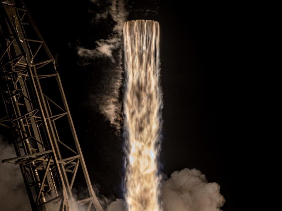 A SpaceX Falcon 9 rocket launching at night (SpaceX)