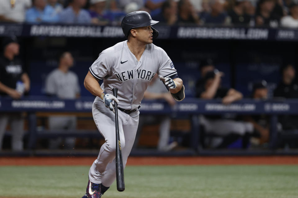 New York Yankees watches his two-run double against the Tampa Bay Rays during the seventh inning of a baseball game Friday, Aug. 25, 2023, in St. Petersburg, Fla. (AP Photo/Scott Audette)