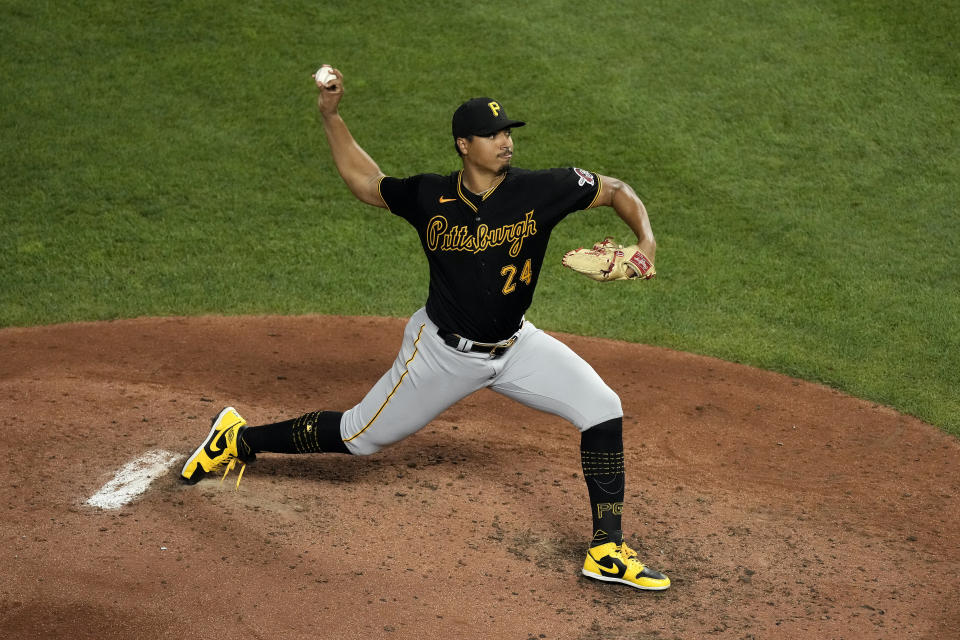 Pittsburgh Pirates starting pitcher Johan Oviedo throws during the fifth inning of a baseball game against the Kansas City Royals Monday, Aug. 28, 2023, in Kansas City, Mo. (AP Photo/Charlie Riedel)