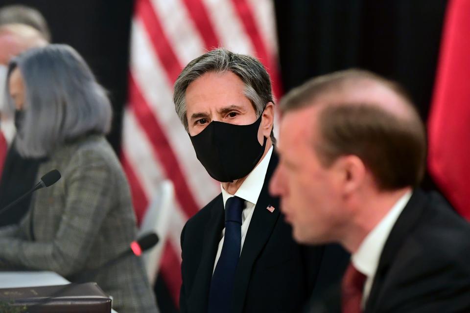 Secretary of State Antony Blinken, second from right, listens as national security adviser Jake Sullivan, right, speaks at the opening session of US-China talks at the Captain Cook Hotel in Anchorage, Alaska, Thursday, March 18, 2021.