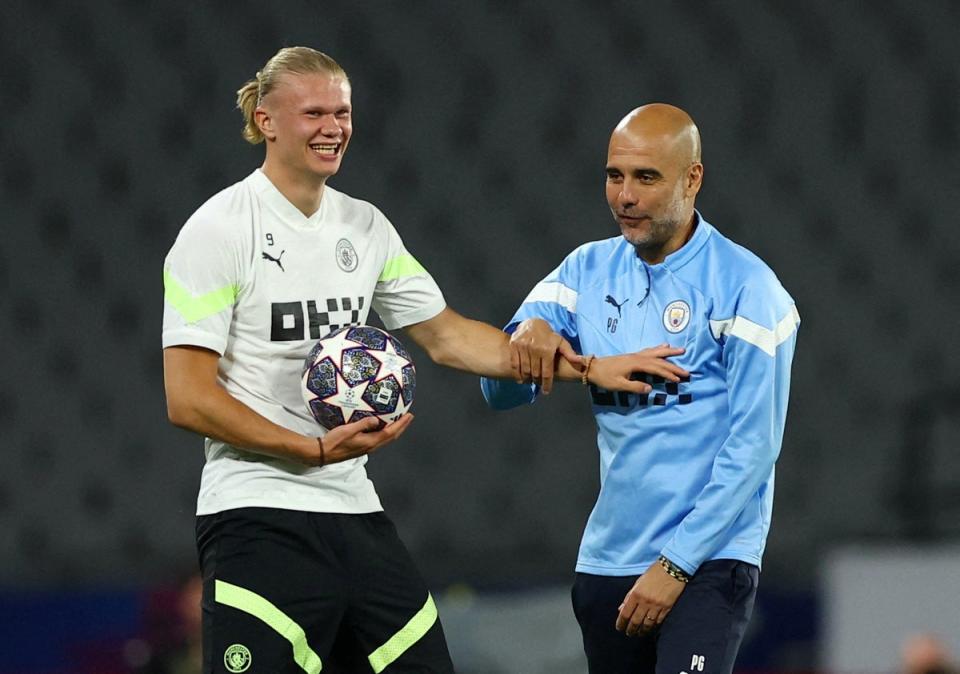 Pep Guardiola and Erling Haaland before the Champions League final (REUTERS)