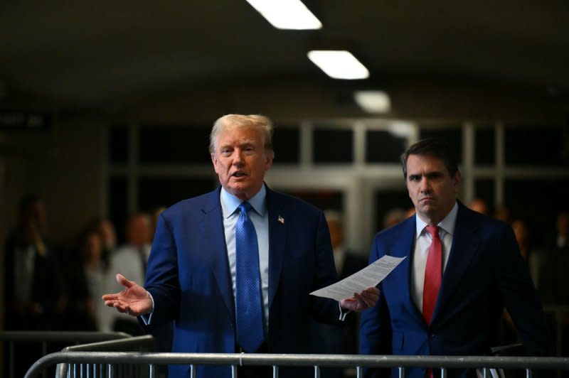 Former President Donald Trump speaks to reporters as he arrives for his trial at Manhattan criminal court in New York on Thursday, May 9, 2024. Pool Photo by Angela Weiss/UPI