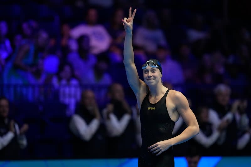 Gretchen Walsh reacts after winning the women's 100m butterfly final, Sunday, June 16, 2024, at the U.S. Olympic Swimming Trials in Indianapolis. | Michael Conroy