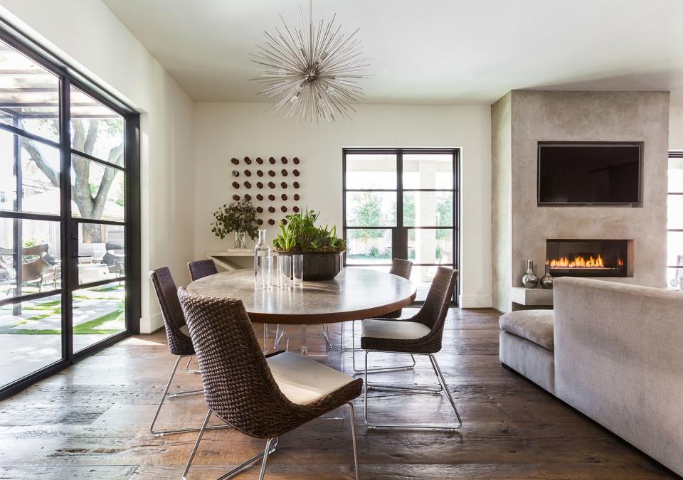 A cozy dining room area in an open floor plan