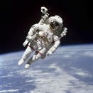 <p>NASA astronaut Bruce McCandless II died on Dec. 21 at age 80. McCandless was the first human to float untethered in space. (Photo: NASA via AP) </p>