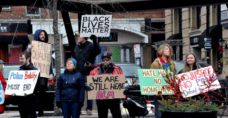 A large group of demonstrators gathered on Wooster Public Square on the 900th consecutive day of protesting social injustice.