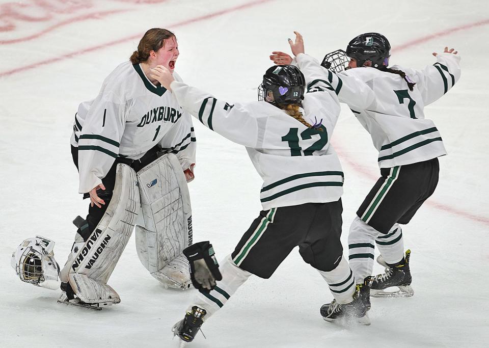 Duxbury with the MIAA State Championship in 4-0 shutout of Falmouth. Shutout goalie Anna McGinty starts the celebration for Duxbury as teammates Madeleine Greenwood and Samantha Norton join her.


MIAA State Championship Hockey at the TD Garden Sunday March 17, 2024
