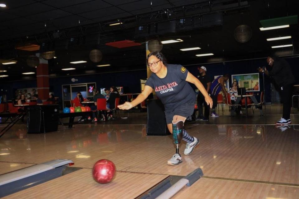 Seig Marx, 42, of Gibson, bowls at Creole Lanes, Aug. 8, with One Step Closer, an amputee support group.
