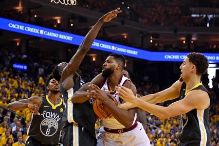 June 3, 2018; Oakland, CA, USA; Cleveland Cavaliers center Tristan Thompson (13) grabs a rebound during the second quarter against Golden State Warriors guard Klay Thompson (11) in game two of the 2018 NBA Finals at Oracle Arena. Kyle Terada-USA TODAY Sports