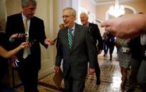 Senator Majority Leader Mitch McConnell is trailed by reporters as he walks to the Senate floor of the U.S. Capitol after unveiling a draft bill on healthcare in Washington, U.S. June 22, 2017. REUTERS/Kevin Lamarque