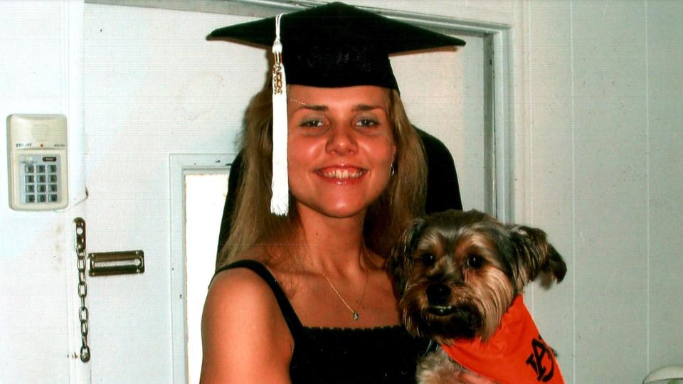 Lori Ann Slesinski with her beloved Peanut. Slesinski had just graduated from college when she disappeared in 2006 from Auburn, Alabama. / Credit: Arlene Slesinski