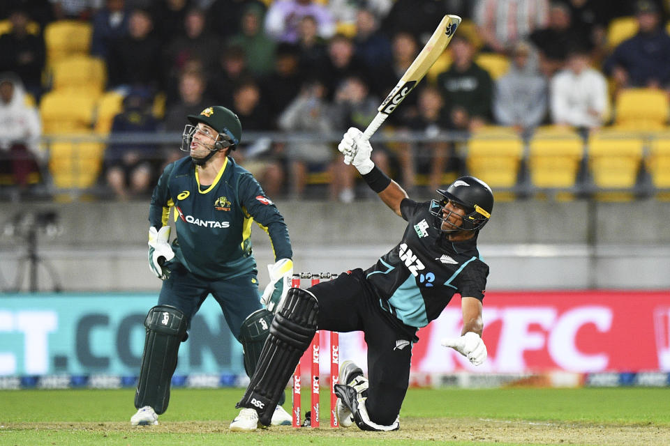 New Zealand's Rachin Ravindra falls as he bats during the T20 cricket international between Australia and New Zealand in Wellington, New Zealand, Wednesday, Feb. 21, 2024. (Chris Symes/Photosport via AP)