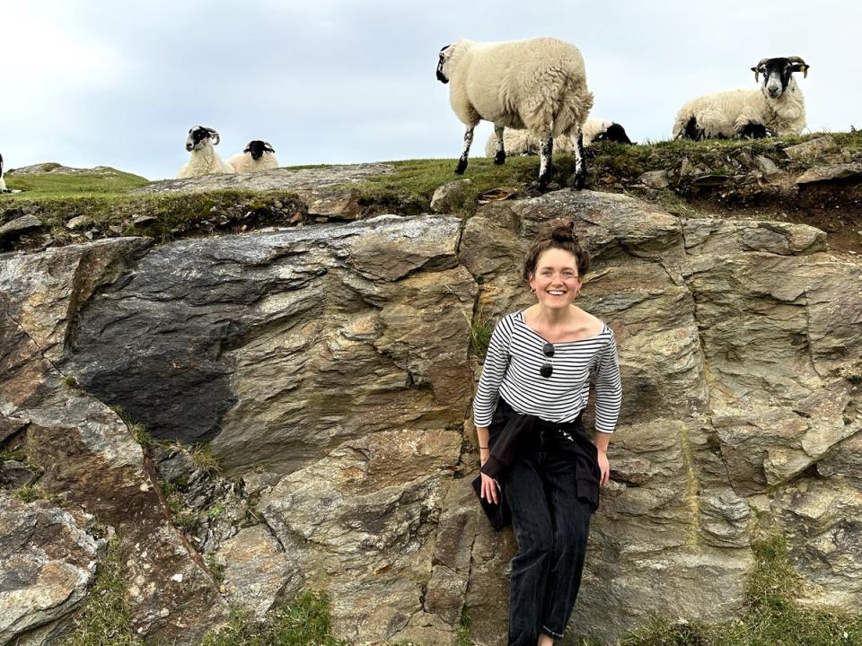 Ewe and me: Aisling with the animals that appeared throughout her trip (Aisling O’Leary)