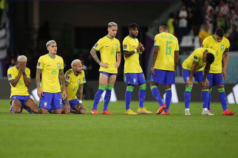 Brazil players react during the penalty shootout at the World Cup quarterfinal soccer match between Croatia and Brazil, at the Education City Stadium in Al Rayyan, Qatar, Friday, Dec. 9, 2022. (AP Photo/Martin Meissner)