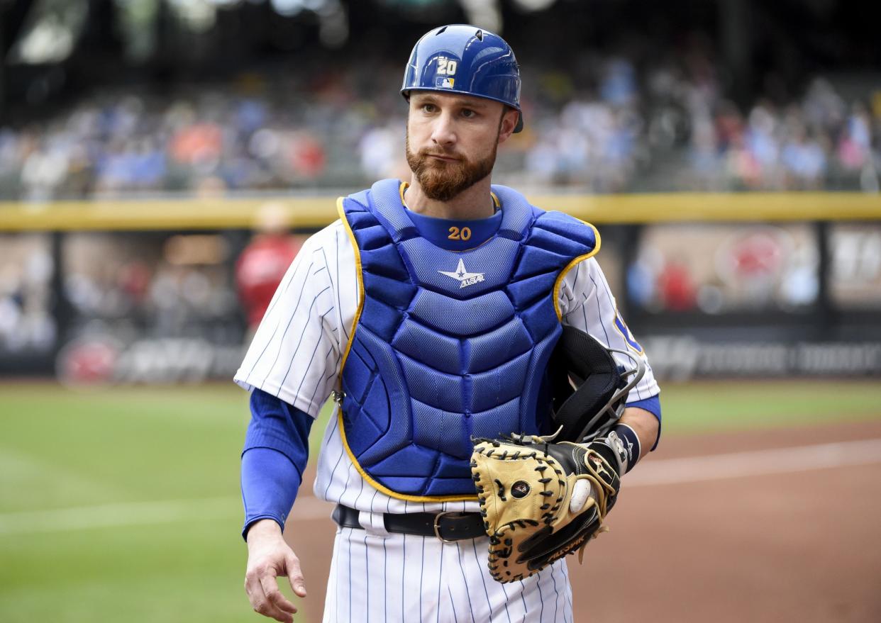 Jonathan Lucroy may never wear the catcher's gear again for Milwaukee. (AP)