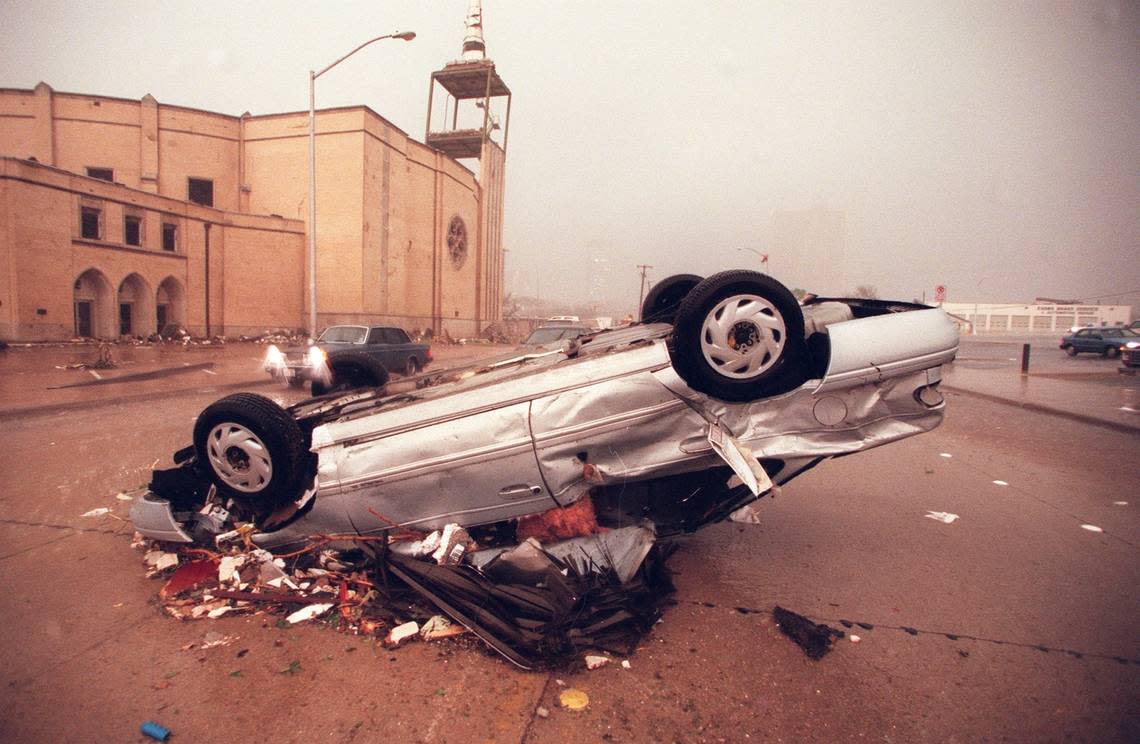A tornado on March 28, 2000, overturned car near the heavily damaged Calvary Cathedral International at 1600 W. Fifth St. on the east side of Trinity River. Two women who were in the prayer tower were untouched by the 100-mph winds that ripped away the tower’s walls. Today the site is The Braden on Fifth apartment building.