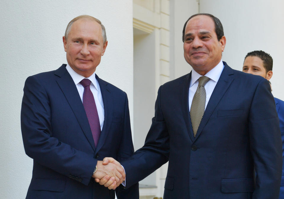 Russian President Vladimir Putin, left, and Egyptian President Abdel-Fattah el-Sissi, shake hands during their meeting in Sochi, Russia, Wednesday, Oct. 17, 2018. (Alexei Druzhinin, Sputnik, Kremlin Pool Photo via AP)