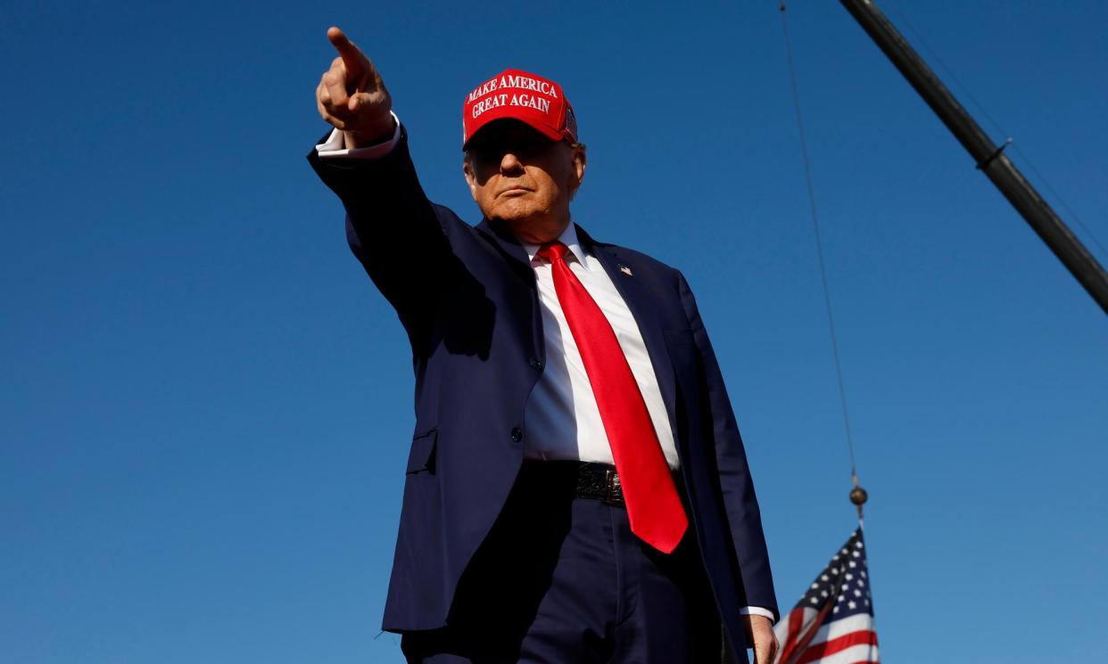 <span>Donald Trump arrives for a campaign rally in Wildwood Beach, New Jersey, on Saturday.</span><span>Photograph: Michael M Santiago/Getty Images</span>