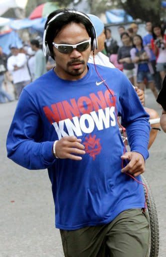 Philippine boxing icon Manny Pacquiao jogs with his fans at the start of his training in Baguio City, north of Manila in April 2012. "Somebody asked me what my opinion of legalizing same-sex marriage is," Pacquiao said. "I said what I think. It is against the law of God."