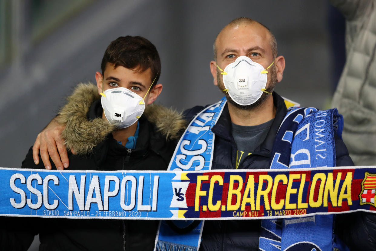 Some fans at Tuesday's Napoli-Barcelona Champions League clash in Italy wore masks to protect against the coronavirus. (Photo by Michael Steele/Getty Images)