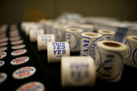 Buttons and labels are displayed before a rally held by The International Association of Machinists and Aerospace Workers for Boeing South Carolina workers before Wednesday's vote to organize, in North Charleston, South Carolina, U.S. February 13, 2017. REUTERS/Randall Hill