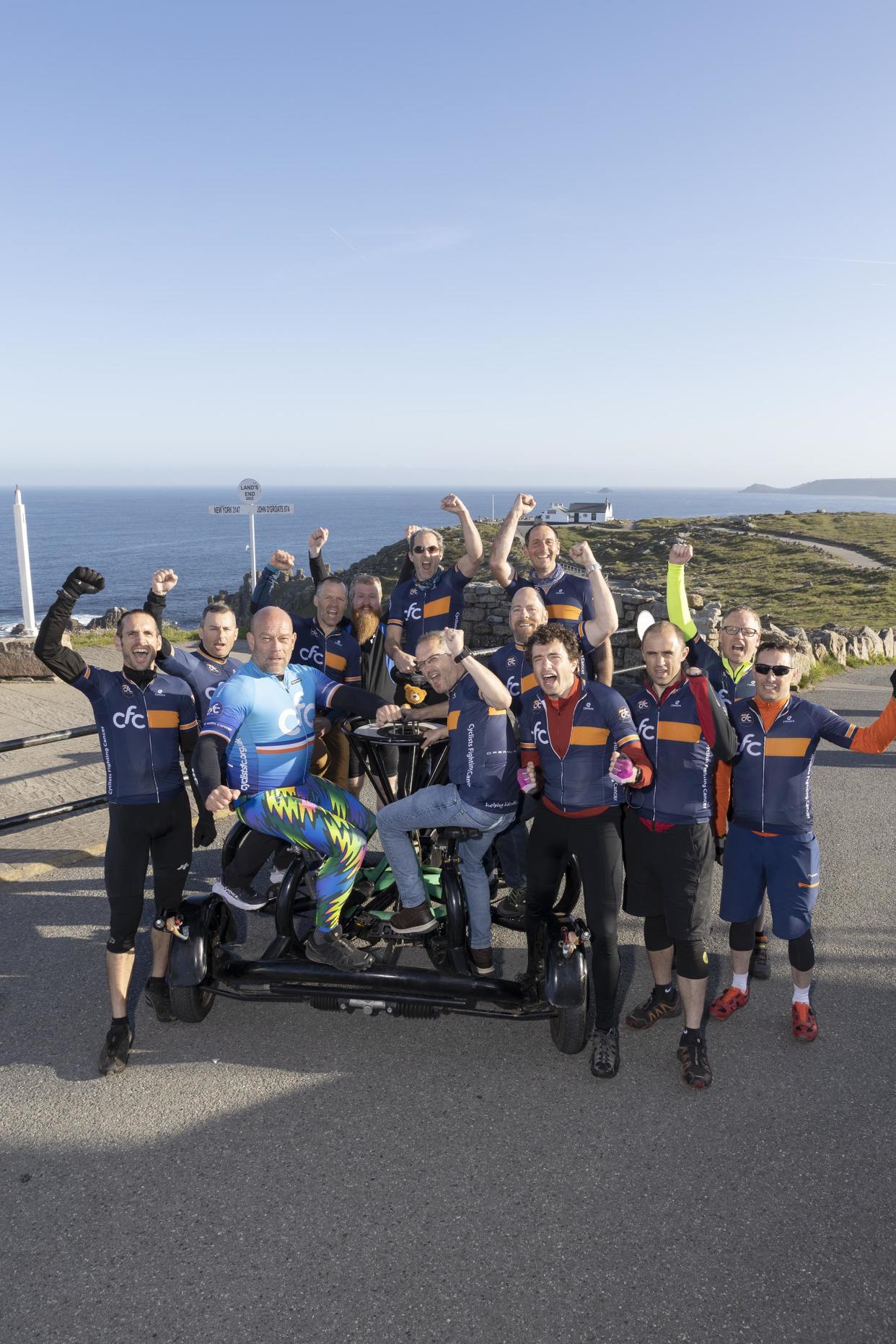 A group of university friends will have broken the record for cycling the length of the UK on a conference bike.