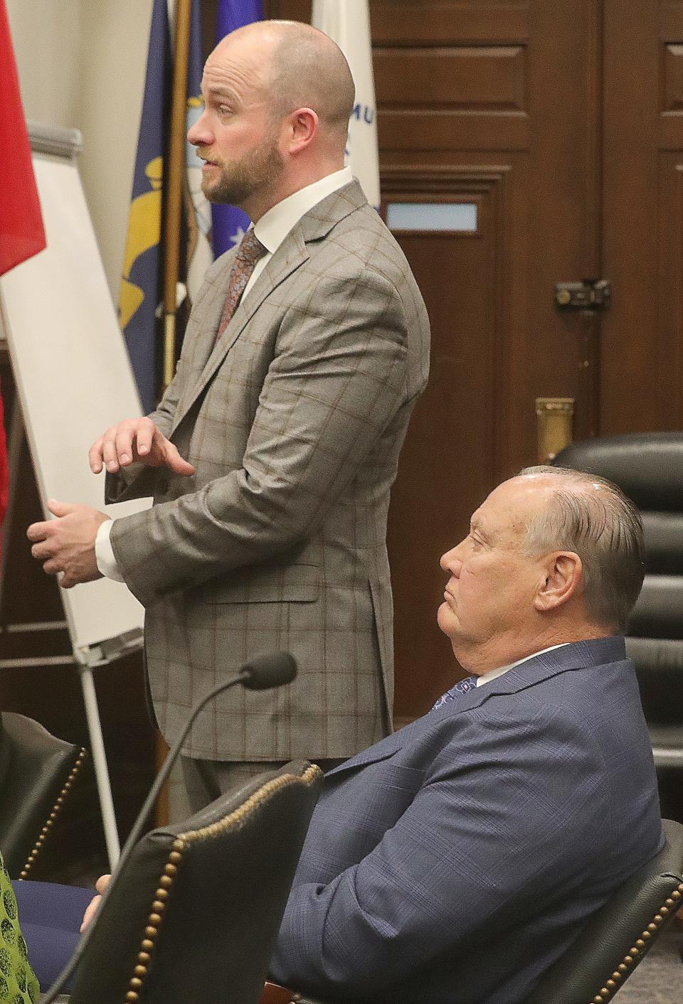 Defense attorney Noah Munyer requests an arm GPS monitor for his client former FirstEnergy CEO Charles "Chuck" Jones during an arraignment hearing in Summit County Court with Judge Susan Baker Ross on charges related to the FirstEnergy scandal on Tuesday, Feb. 13, 2024, in Akron, Ohio. [Phil Masturzo/ Beacon Journal]