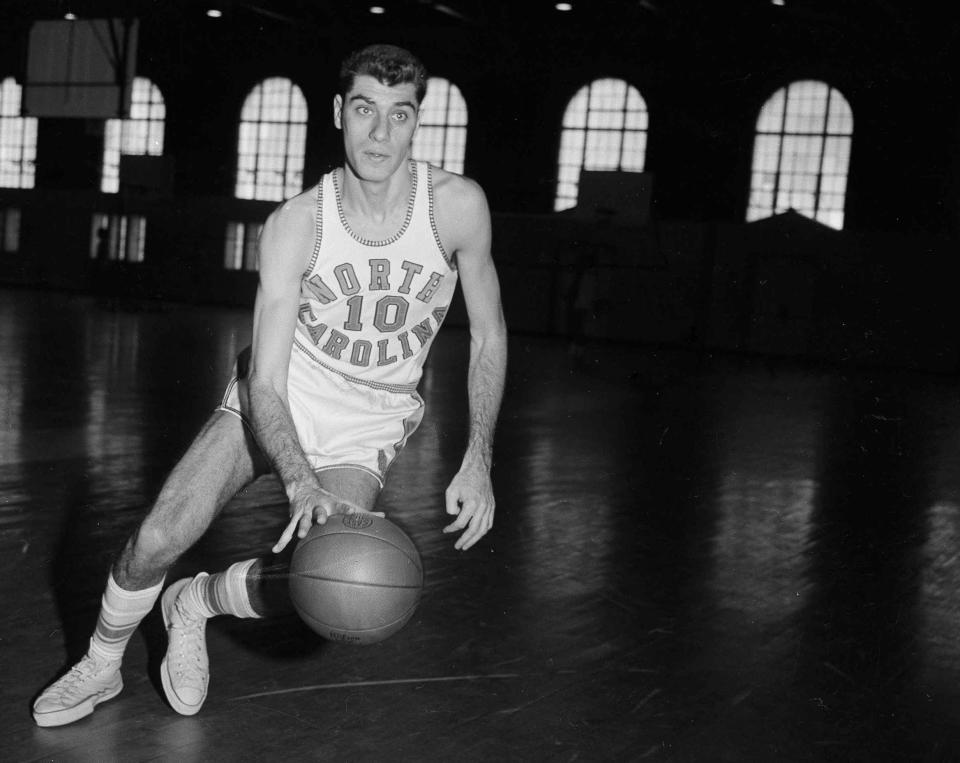 FILE - North Carolina basketball star Lennie Rosenbluth is shown during a practice session Feb. 27, 1957, location not known. Rosenbluth, who led North Carolina to its first basketball NCAA title in 1957 with a victory over Wilt Chamberlain and Kansas in the championship game, died Saturday, June 18, 2022. He was 89. (AP Photo/File)